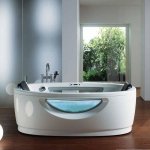 Гидромассажная ванна TEUCO ( ТЕУКО ). Овальная ванна с панелями для установки в центре помещения Ysola 185*100